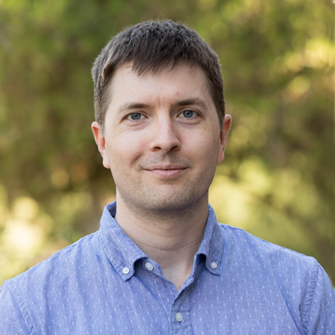 Man in light blue shirt