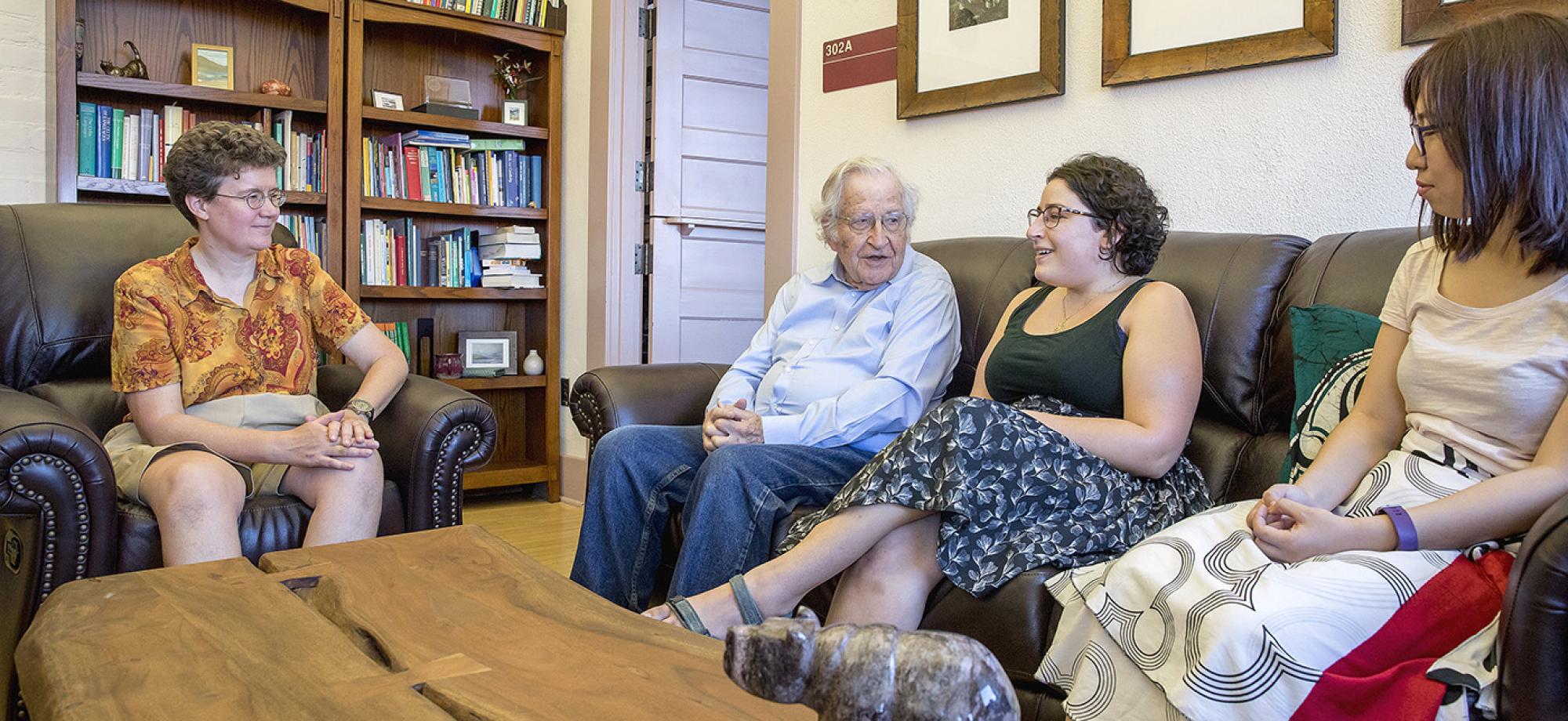 Noam Chomsky speaking with Linguistics department members.